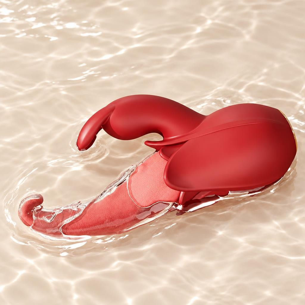 Red dual stimulation vibrator with a pink shaft partly in clear water on a sand-colored background